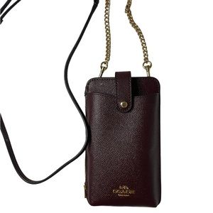 Coach cross body wallet bag.
